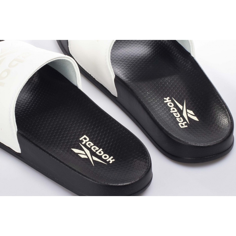 white reebok slides
